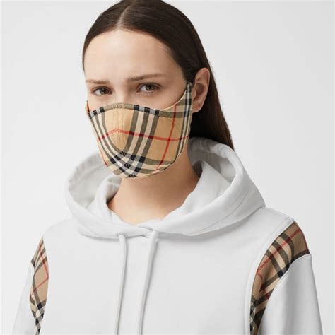 mundschutz burberry muster|Burberry releases face mask with signature check on  .